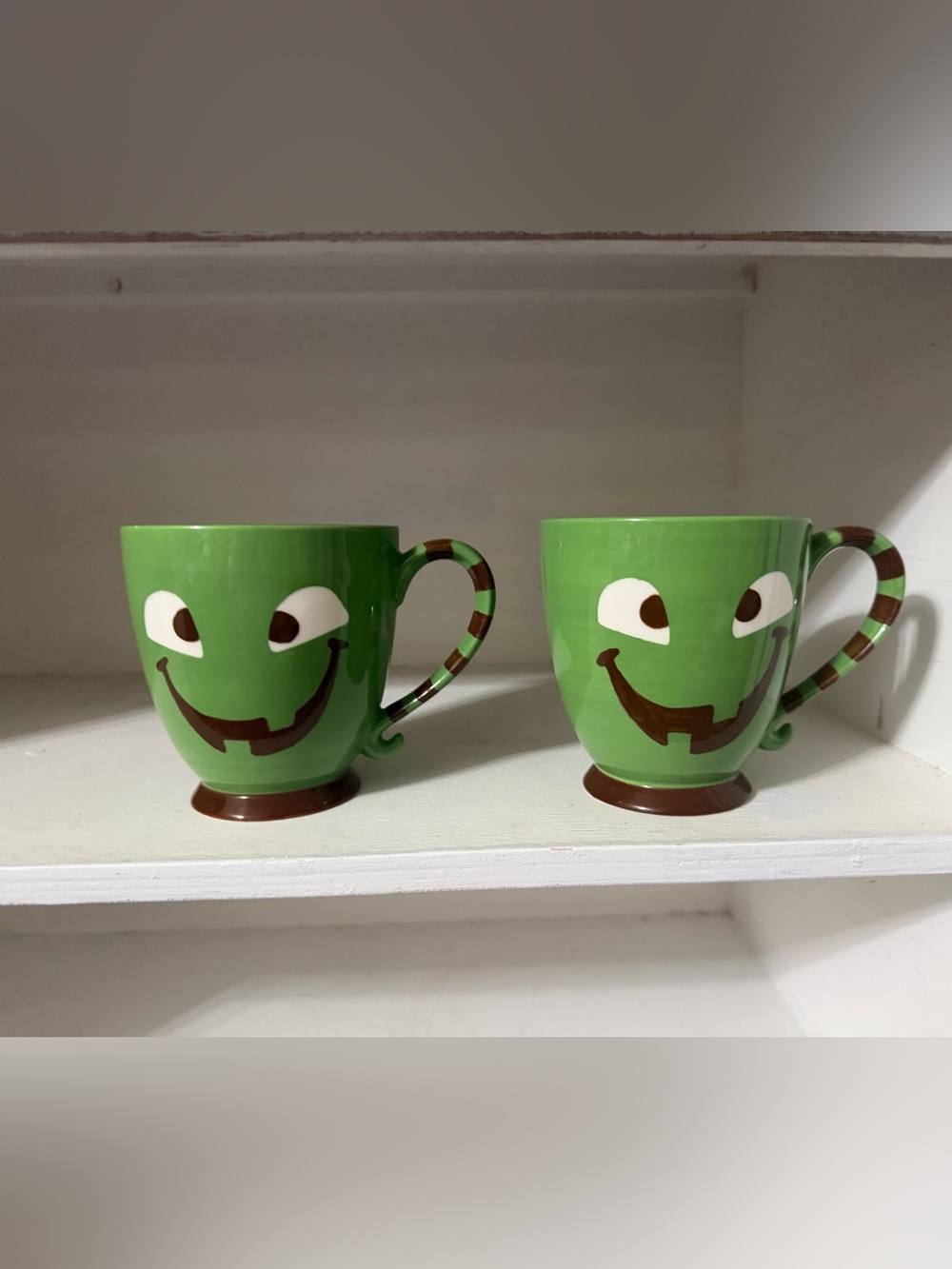 Two Starbucks collectible, limited 2007 Halloween ceramic monster face mugs.